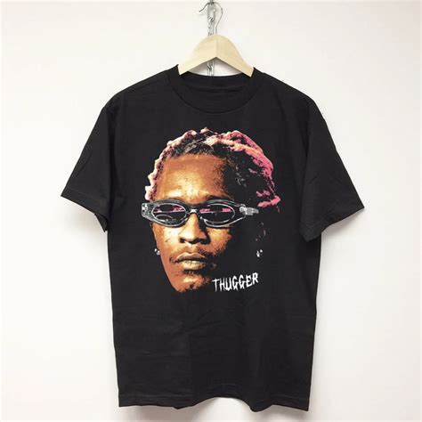 Young Thug Graphic T-Shirt. Icy. $35.00. Shipping calculated at checkout. Size. Mens Small Mens Medium Mens Large Mens XL Mens 2XL Mens 3XL Mens 4XL. Gender. Mens. Color. 